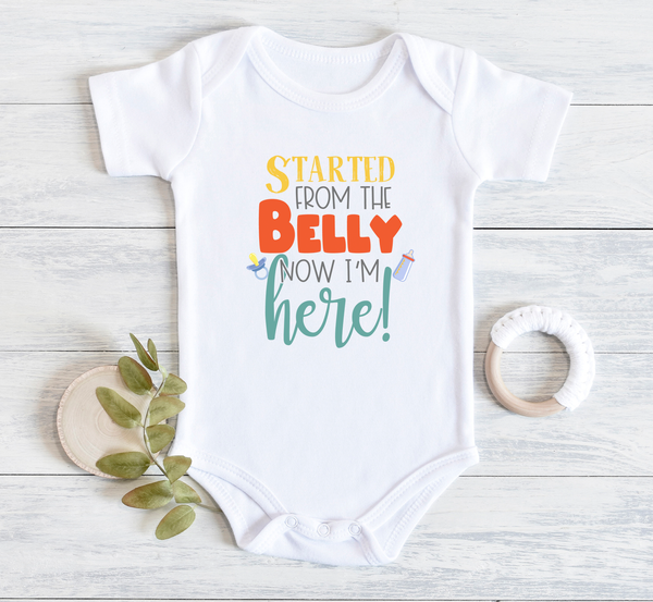 STARTED FROM THE BELLY NOW I'M HERE Funny Newborn Onesie Baby Body Suit White - HappyAddition